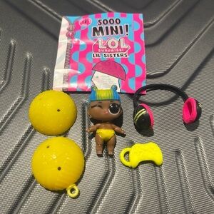 L.O.L. Surprise! Lil Sisters Mini Doll with Accessories - Yellow PINK DANCE CLUB